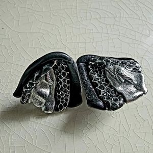 Avant-garde 1980s black and silver triangular clip on earrings